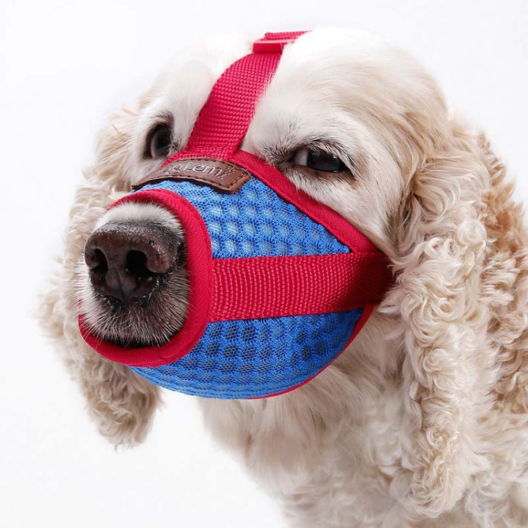Dog muzzle with breathable blue mesh cover and red strap, secure fit for mouth