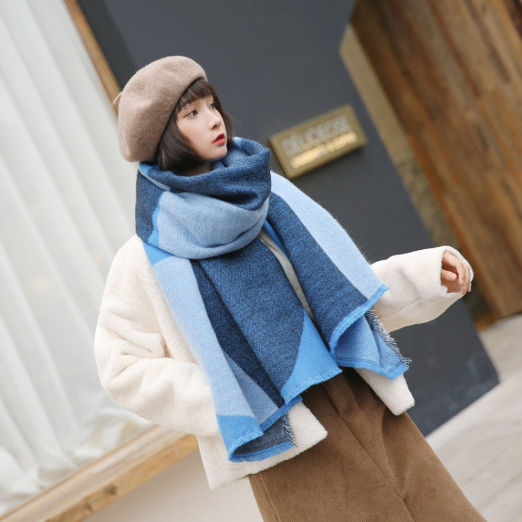 Blue geometric color-block scarf shawl with fringed hem worn with coat