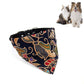 Triangular pet saliva towel bib with adjustable black strap and colorful cat-head pattern