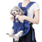 Blue quilted pet chest bag with mesh front, worn with a small dog sitting inside