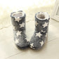 Pair of winter home boot slippers in dark blue-gray with white star print, open toe view