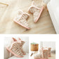 Beige knit indoor slippers with pink fuzzy trim, shown from different angles.