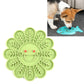 Green silicone flower-shaped slow food mat with raised leaf sections and dots