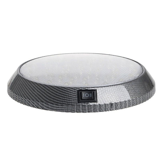 Low-profile round LED roof light with clear top and black rim