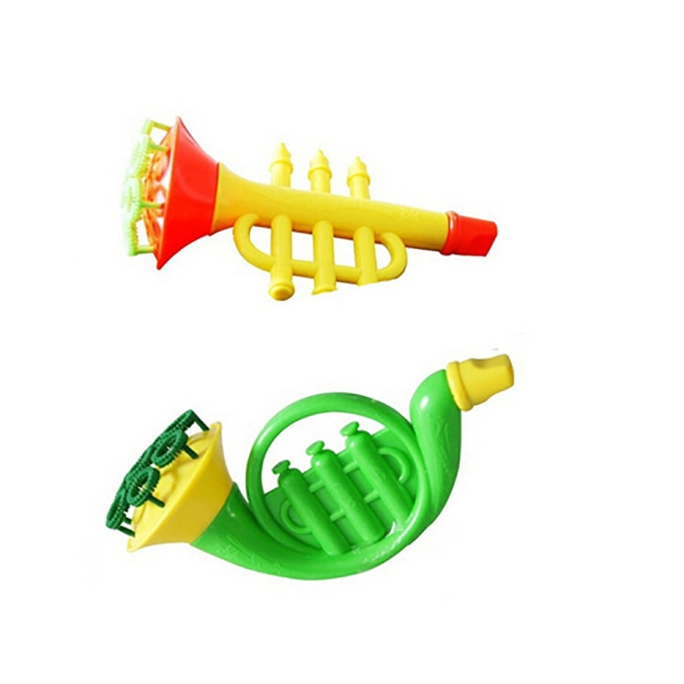 Bubble blower toy with red horn, green circular bubble wand, and yellow spout