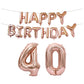 Rose gold foil number balloons 4 and 0 with 'Happy Birthday' banner