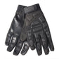 Black protective motorcycle gloves, close-up of textured knuckle and palm grip