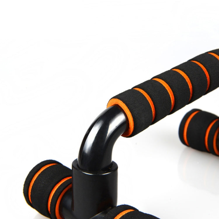Black push-up bracket handle with orange ringed foam grip pad