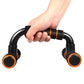 Hand holding a black H-shaped push-up bracket with orange foam grip pads