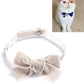 Velvet pet collar with beige bowknot and adjustable strap, no bell.