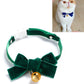 Velvet pet collar with green bowknot and bell, adjustable strap.
