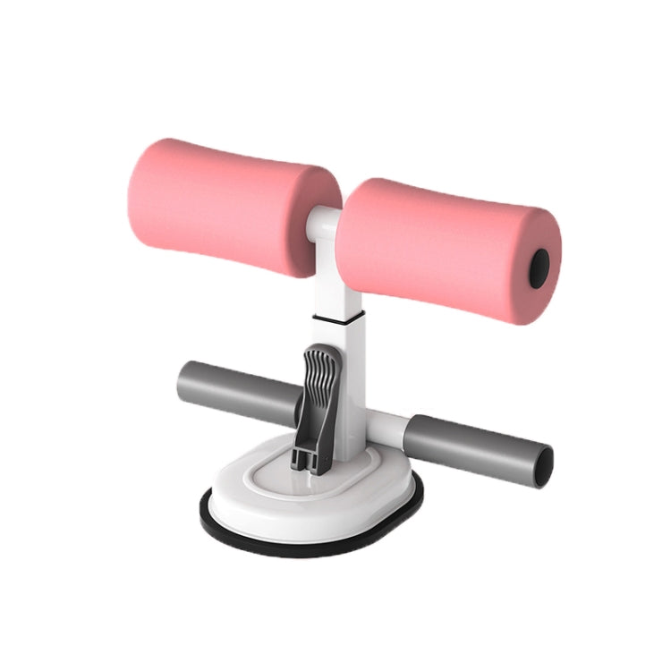 Abdominal crunch assist device, peach-pink padded rollers on white stand base