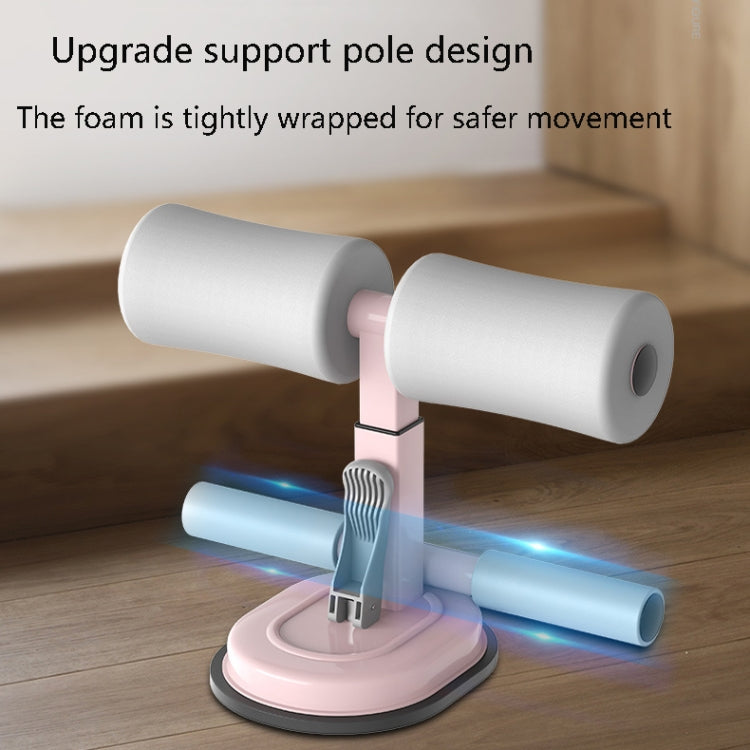 Abdominal crunch assist device with white and light-blue foam rollers, pink base