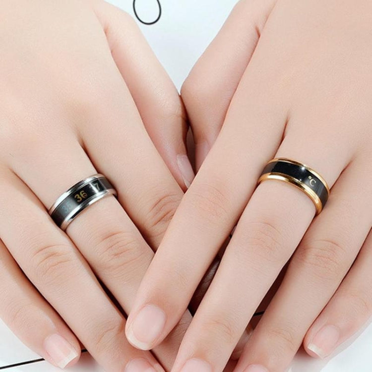 Couple smart temperature display rings in silver and rose gold tones with °C scales