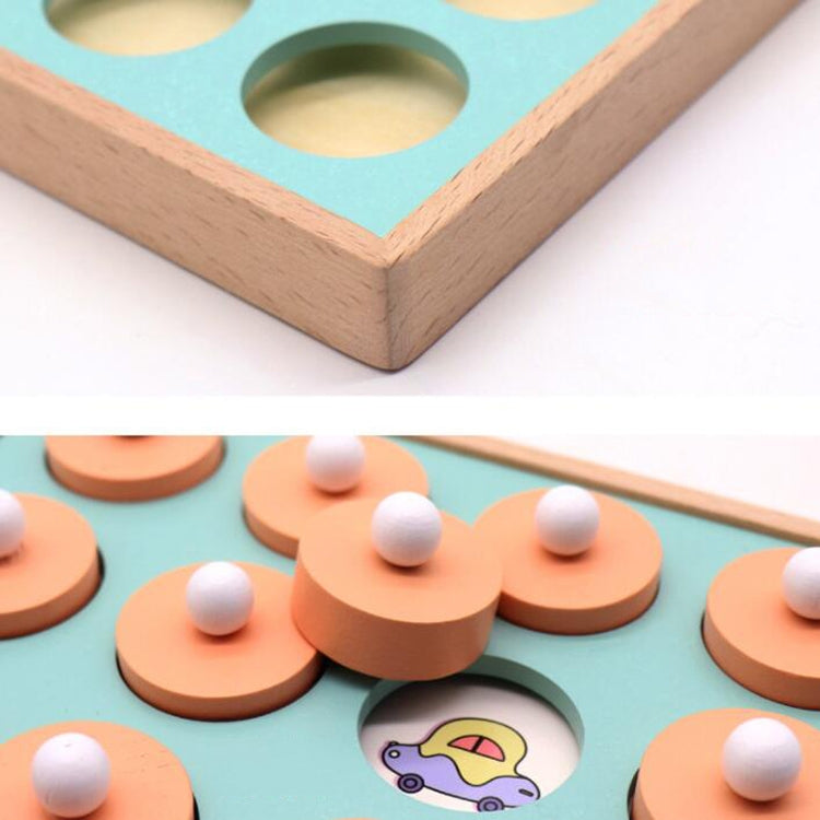 Bottom view of wooden memory board game corner and teal panel with orange peg tiles