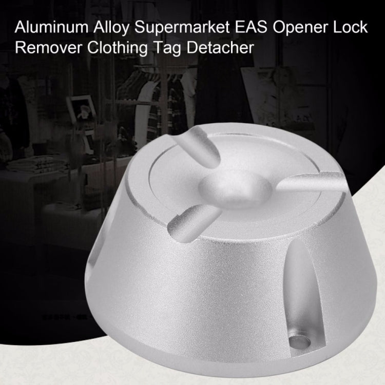Silver EAS open lock remover with textured aluminum finish and three prongs