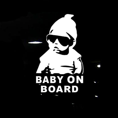 Reflective car window sticker: baby silhouette with sunglasses, “BABY ON BOARD” text