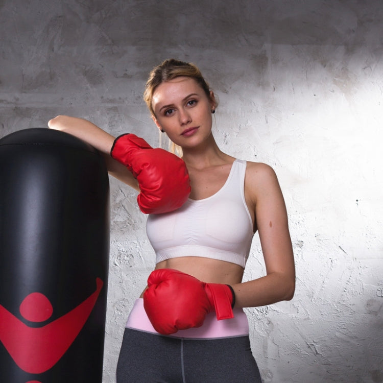 Red boxing gloves with hook-and-loop closure, worn with wrist wraps visible.