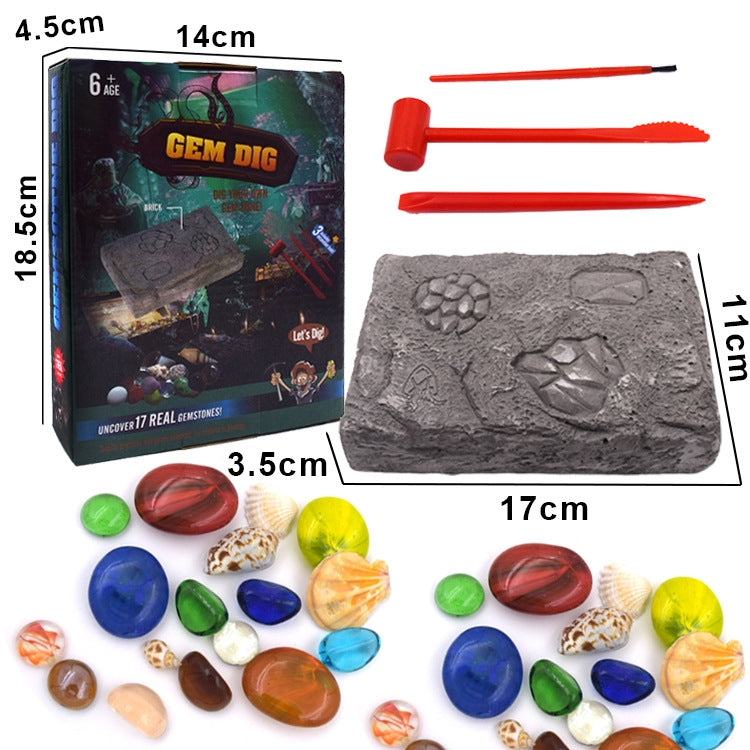Gem dig toy set box, gray excavation rock, and orange tools with size measurements