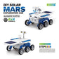 Assembled white and blue solar Mars exploration car toy with solar panels and six wheels.