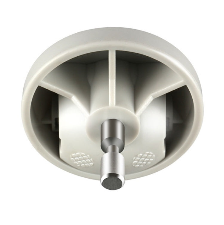 iRobot Roomba guide wheel close-up with central axle and molded grip pads