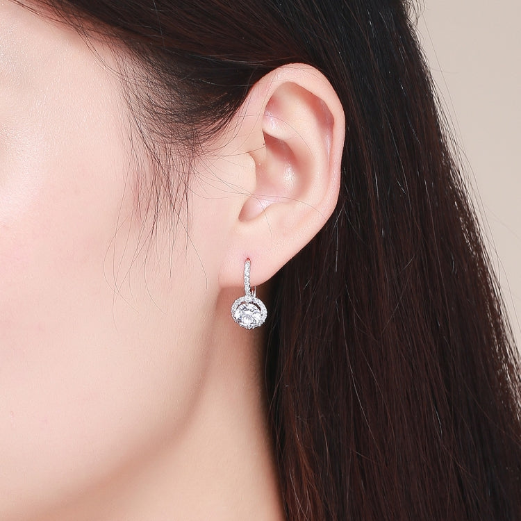 Sterling silver zircon round drop earring on ear