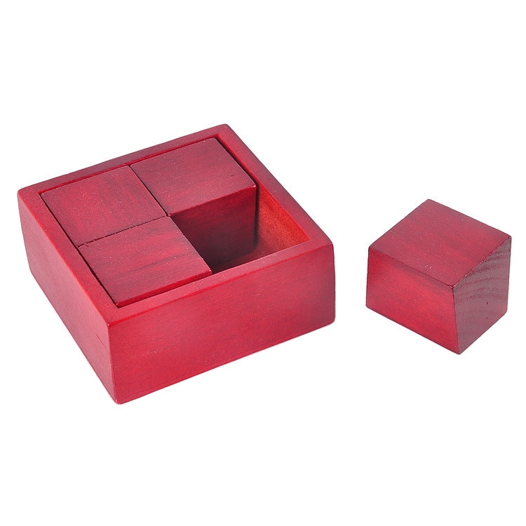 Red wooden block puzzle tray with open center and loose cube piece