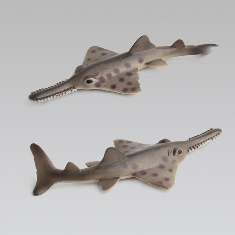 Set of two spotted ray figurines with pointed fins and serrated tail