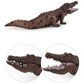 Brown crocodile toy with textured back and teeth along open mouth