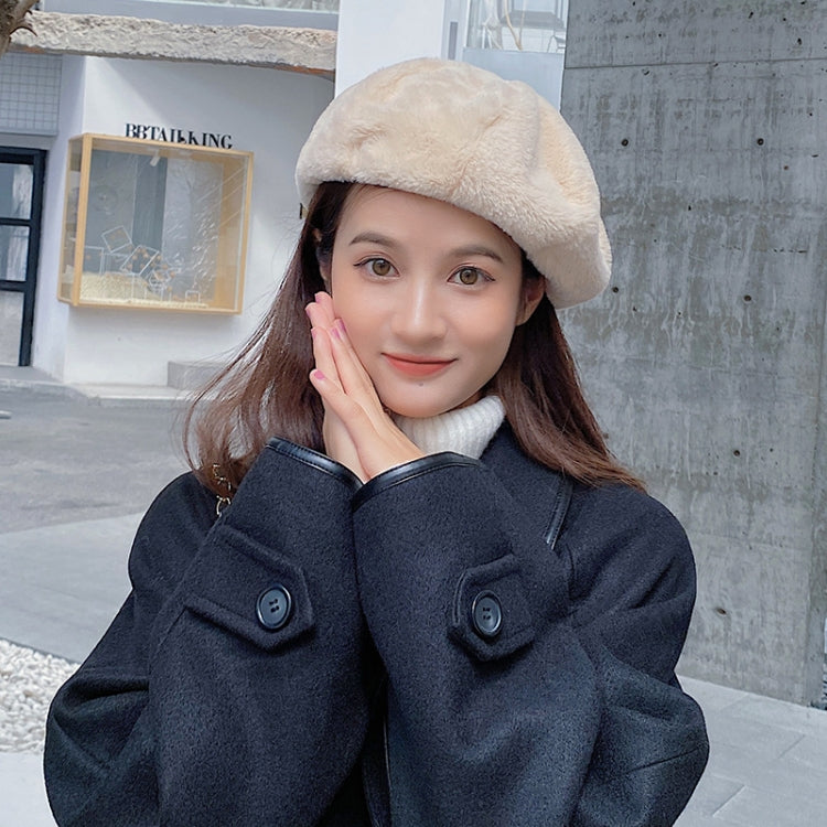 Cozy plush beret hat in light beige with rounded shape and fuzzy finish