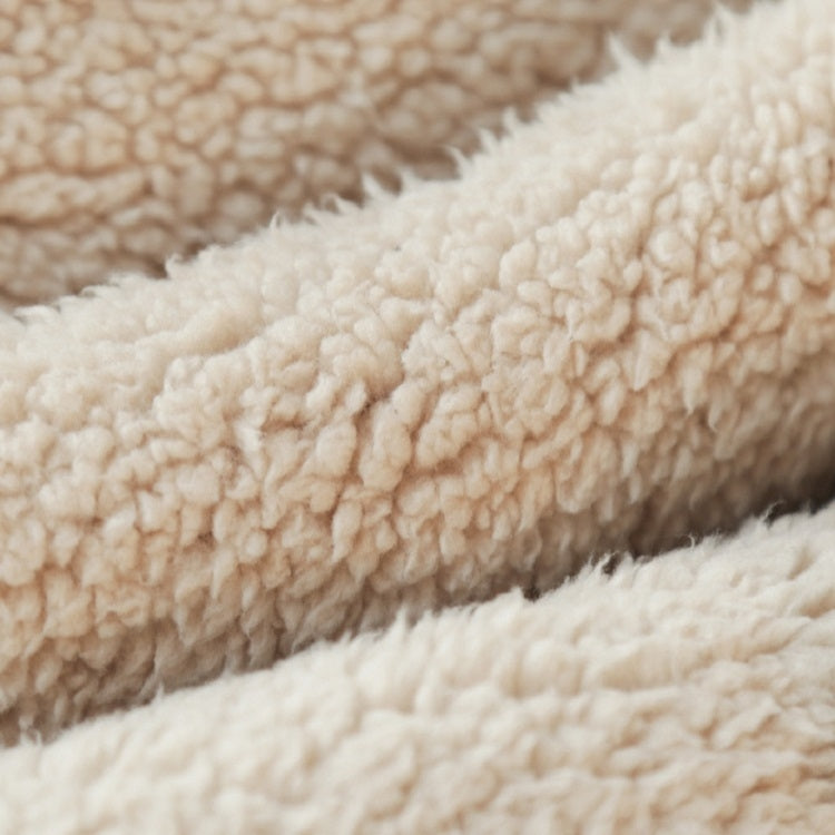 Close-up of plush teddy fleece hood scarf fabric, cream