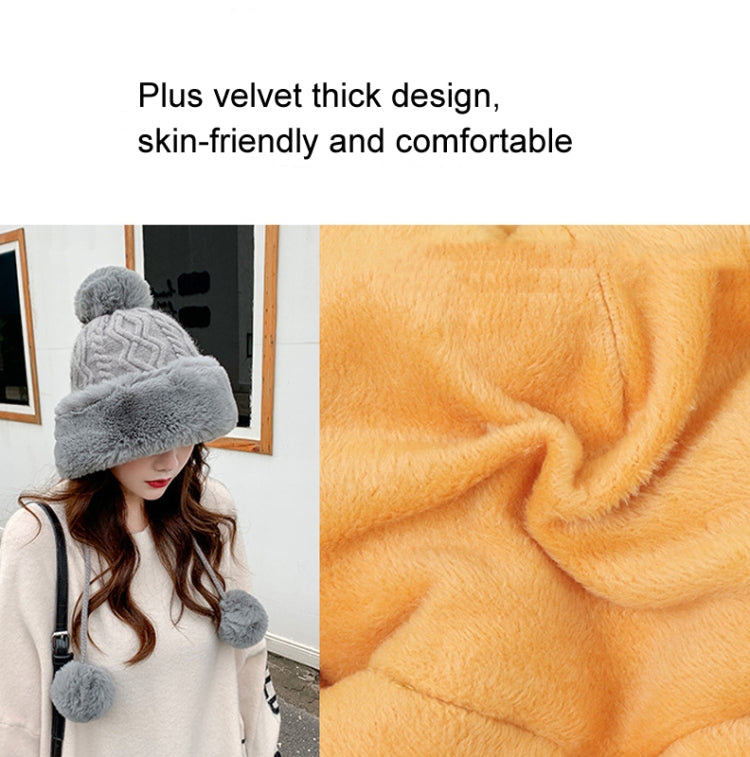 Gray faux-fur pom-pom skullcap beanie with thick plush knit texture