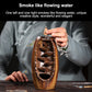 Brown ceramic lotus incense burner with hand holding incense above
