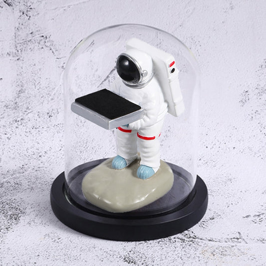Astronaut watch display stand figurine with black shelf base under clear dome