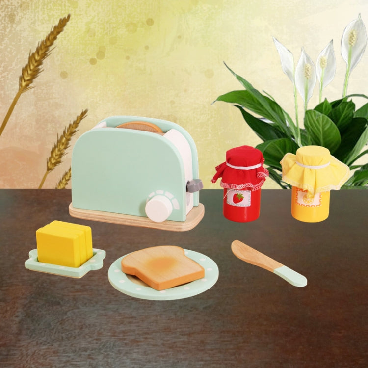 Mint bread maker toy with sliced toast pieces and red and yellow drink cups