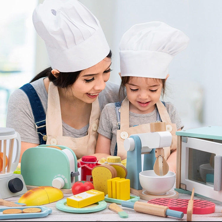 Children’s pretend kitchen set with bread maker, cups, and colorful play food
