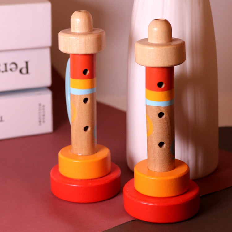 Pair of wooden horn whistle toys with red bases and blue side handles.