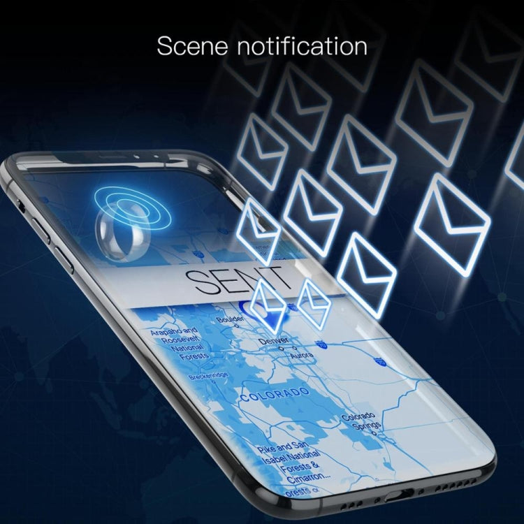 Silver-gray smart ring near a smartphone displaying glowing navigation notifications