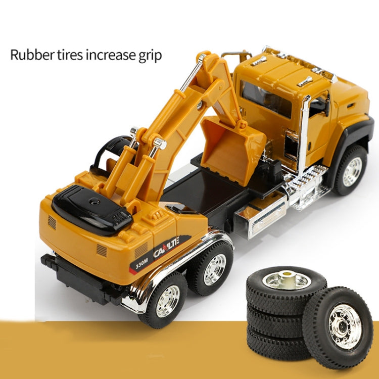 Die-cast backhoe loader toy truck with rubber tires and articulated front loader
