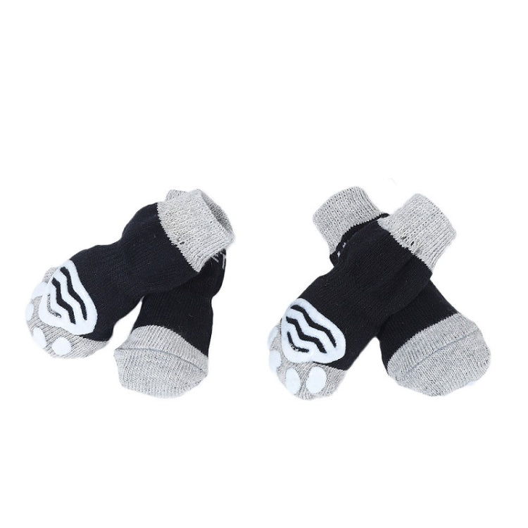 Pair of black and gray cotton anti-scratch dog socks with paw print pattern