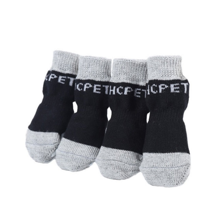Set of four black and gray cotton anti-scratch dog socks with ribbed cuffs