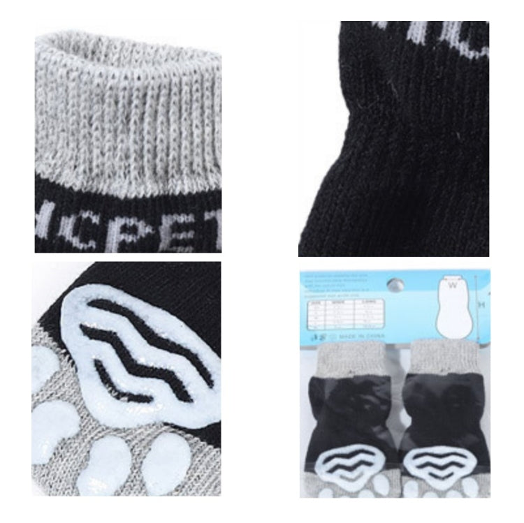 Set of dog anti-scratch socks in gray and dark tones with paw graphic and striped cuffs