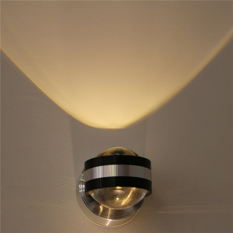 Up-down LED wall lamp, chrome round mount, two warm-white light beams