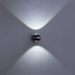 Up-down LED wall lamp, chrome mount casting cool-white upward and downward beams