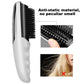Silver electric massage comb with black bristles and side control button