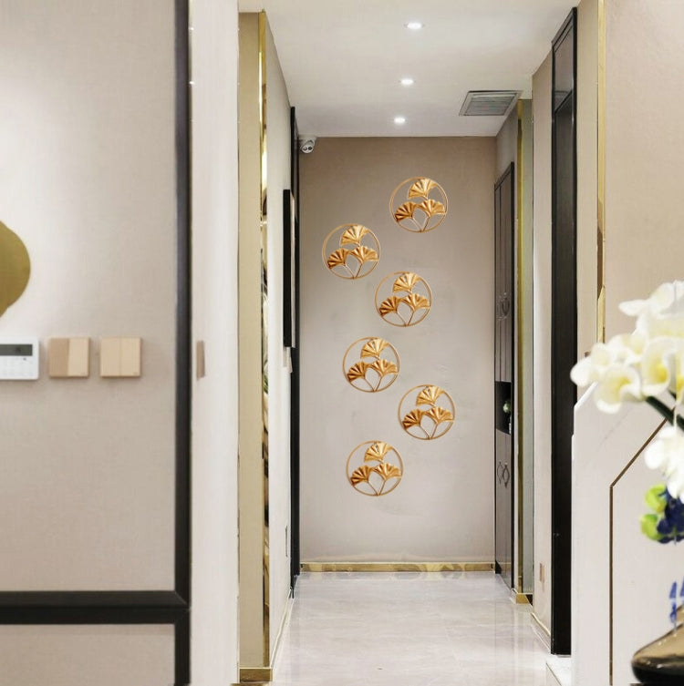 Gold 3D leaf iron wall ornaments with circular ring frames and ginkgo leaf shapes