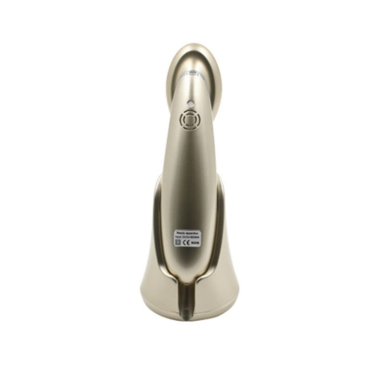 RF hair growth comb scalp massager, gold back view with power icon and label panel