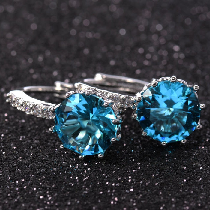 925 sterling silver hoop earrings with two bright blue round zircon stones