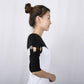 Side view of shoulder fixation belt with black arm cuff and strap closure