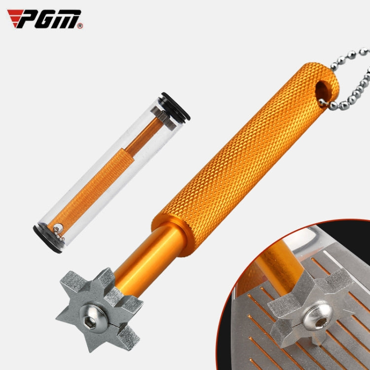 Golf club groove cleaning tool with star-shaped blade, orange knurled handle and chain.